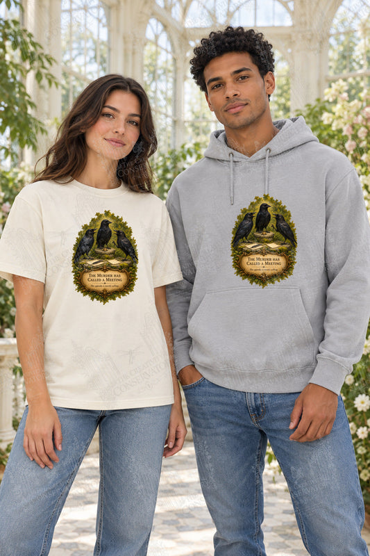 The Murder Has Called a Meeting front-print Comfort Colors T-shirt and hoodie mockup with Wondergate watermark; faint diagonal Wondergate watermark across the entire image