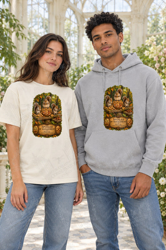 Spoiled by Management front-print Comfort Colors T-shirt and hoodie mockup with Wondergate watermark; faint diagonal Wondergate watermark across the entire image