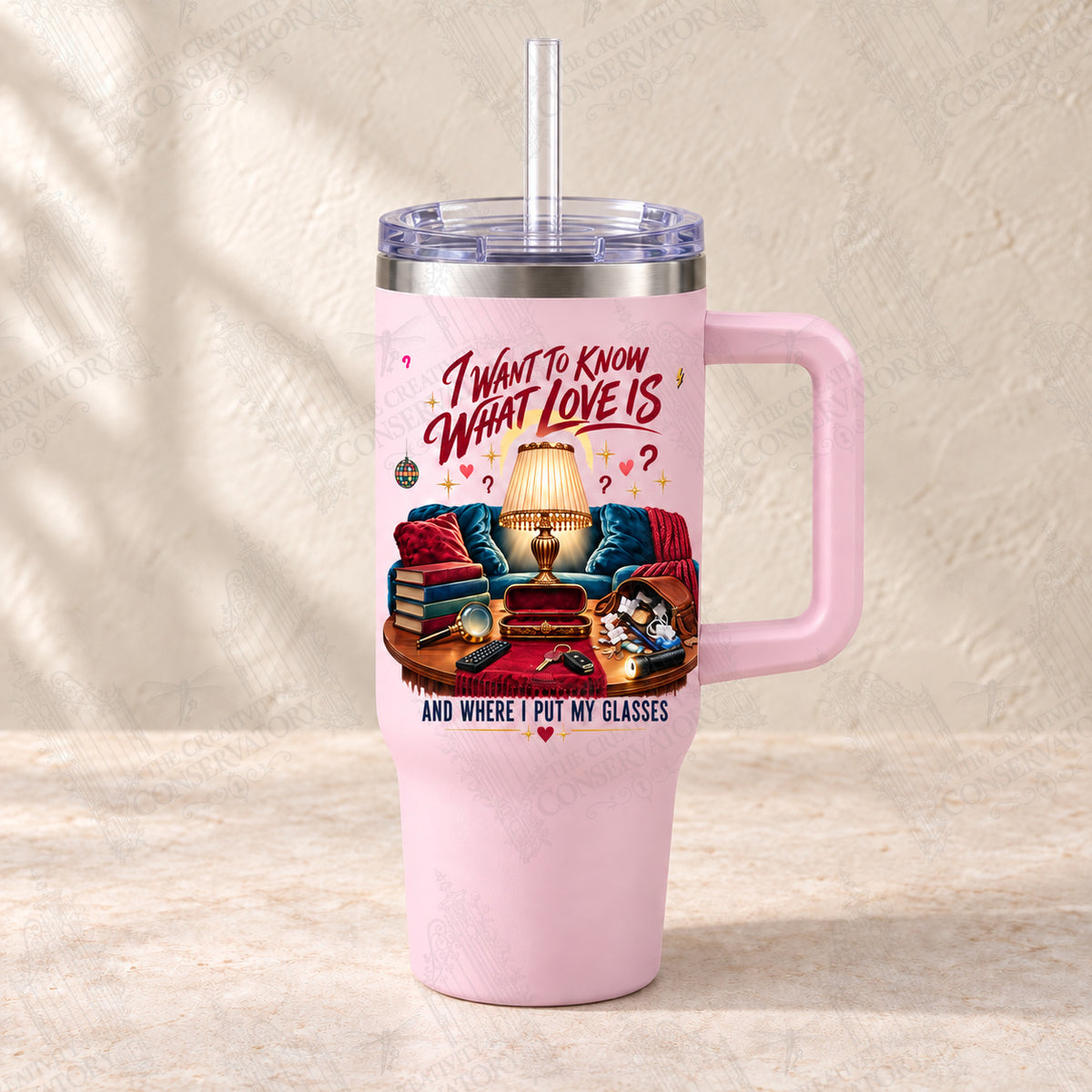 I Want to Know What Love Is—and Where I Put My Glasses on light-pink 30-ounce Big Swig with clear reusable straw; faint diagonal Wondergate watermark across the entire image