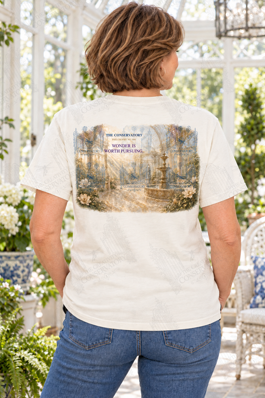 Mature brunette white woman modeling the Philosophy Landscapes with Pocket Motifs Wonder design on the back; faint diagonal Wondergate watermark across the entire image