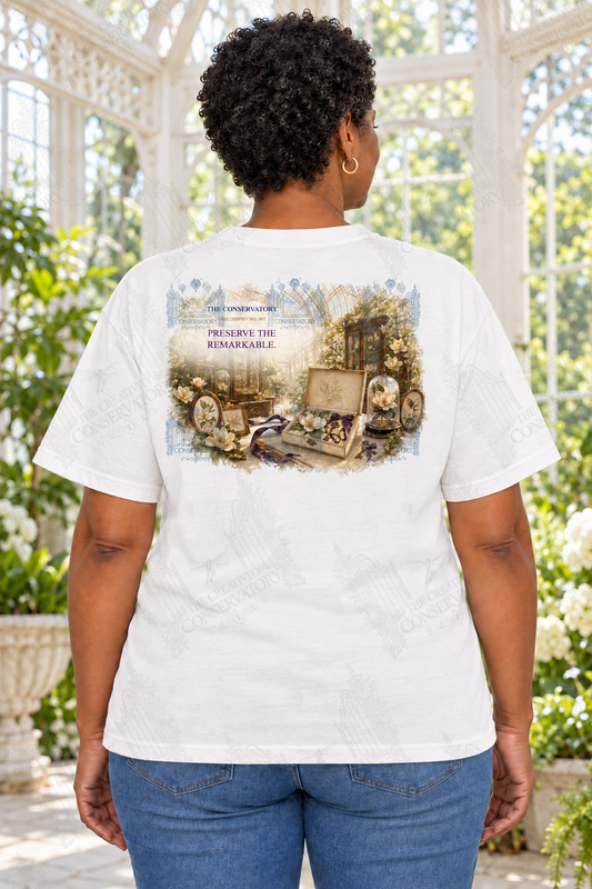 Mature Black woman modeling the Philosophy Landscapes with Pocket Motifs Preserve design on the back; faint diagonal Wondergate watermark across the entire image