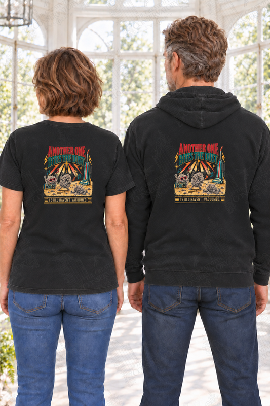 Another One Bites the Dust—I Still Haven’t Vacuumed — back print on approved middle-aged T-shirt and hoodie models; proportional 10-inch-wide artwork; faint diagonal Wondergate watermark across the entire image